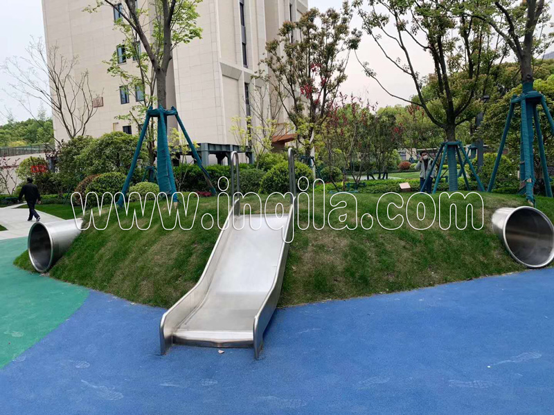 上海闵行海上铭著小区无动力不锈钢滑梯钻洞攀爬组合整体场地定做案例